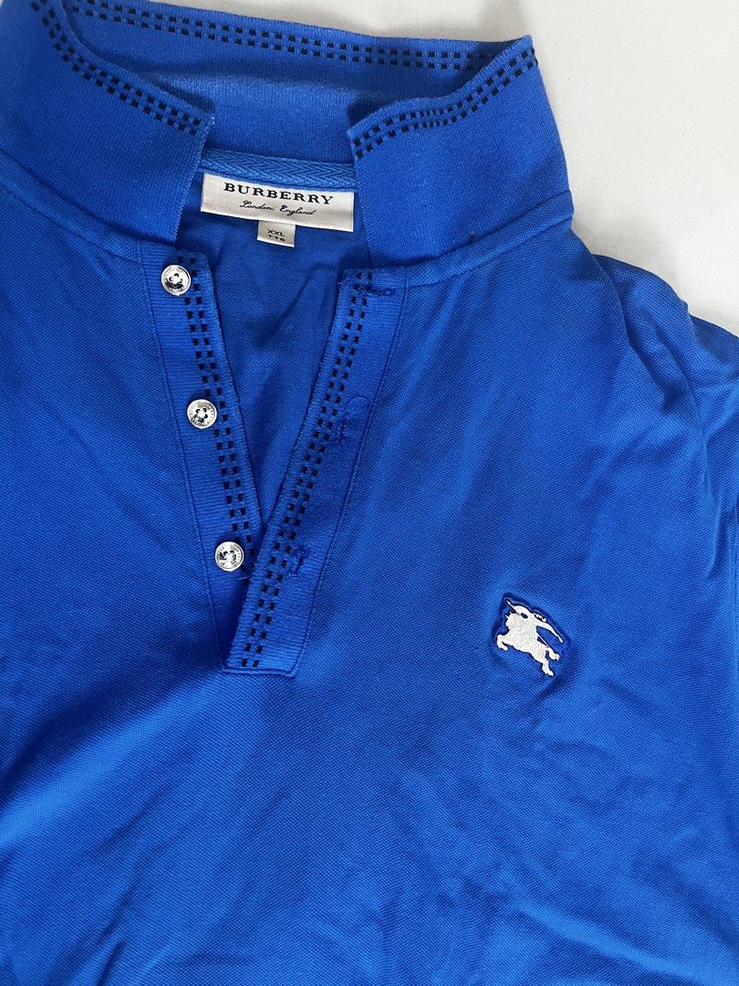 Burberry polo shirt (Category: Luxury Apparel) located in Cuartero. Submitted by johnmichae74239 (Listing ID 1460118838, Image 3). Description: medium to large yung fittings nya even though XXL on tag No issue As new.