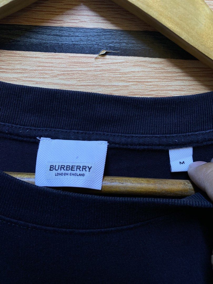 BURBERRY TEE (Category: Tshirts & Polo Shirts ) located in Makati City. Submitted by drip.poww (Listing ID 1460271658, Image 3). Description: - Authentic Burberry - Color: dark gray - Size: Large - Dimes: 23x30 - Authentic - Excellent condition - Need wash, fresh from bale - Material: 100% Cotton Please don’t expect too much—these are thrifted (ukay) items. 😊 !!STILL NEGOTIABLE!!.