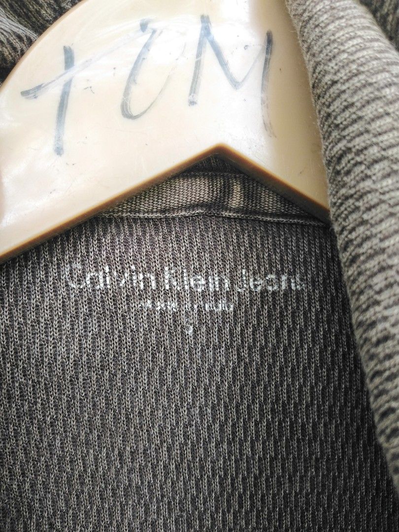 Calvin klein (Category: Coats, Jackets and Outerwear) located in General Santos City (Dadiangas). Submitted by evolveorrepeat (Listing ID 1460133978, Image 3). Description: Calvin klein ribbed knit thermal full zip hoodie Size small on tag Pit to pit 22.5 L"27 Sleeve 30 Vintage graphic logo design,distressed wash Dm to purchase!.