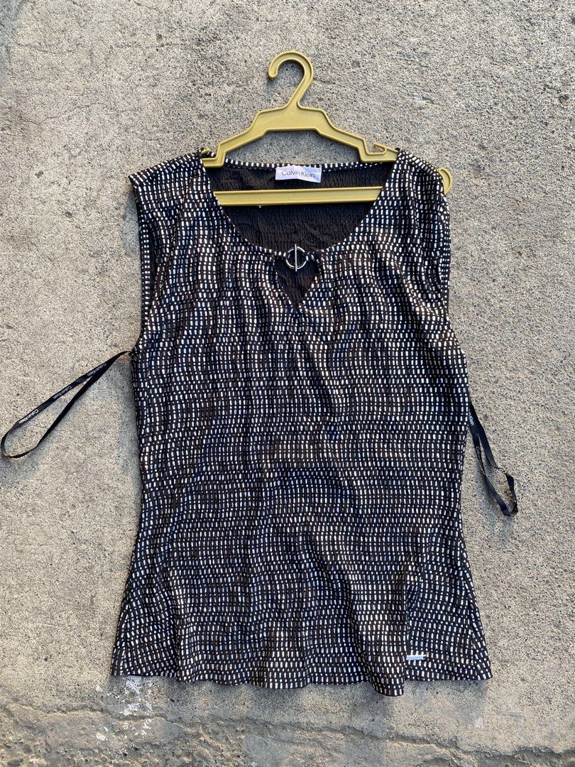 Calvin Klein (Category: Sleeveless) located in Santo Tomas. Submitted by mmnl.pcn (Listing ID 1460275844, Image 1). Description: .