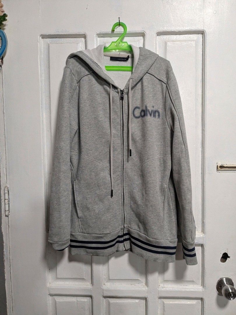 Calvin Klein Jeans Gray Full Zip Jacket (Category: Coats, Jackets and Outerwear) located in Quezon City. Submitted by nnncorner (Listing ID 1460236842, Image 2). Description: Calvin Klein Jeans Gray Full Zip Jacket 9/10 condition no lints , no flaws 100% original! Length 29 inches Width 19 inches Medium on tag 700.