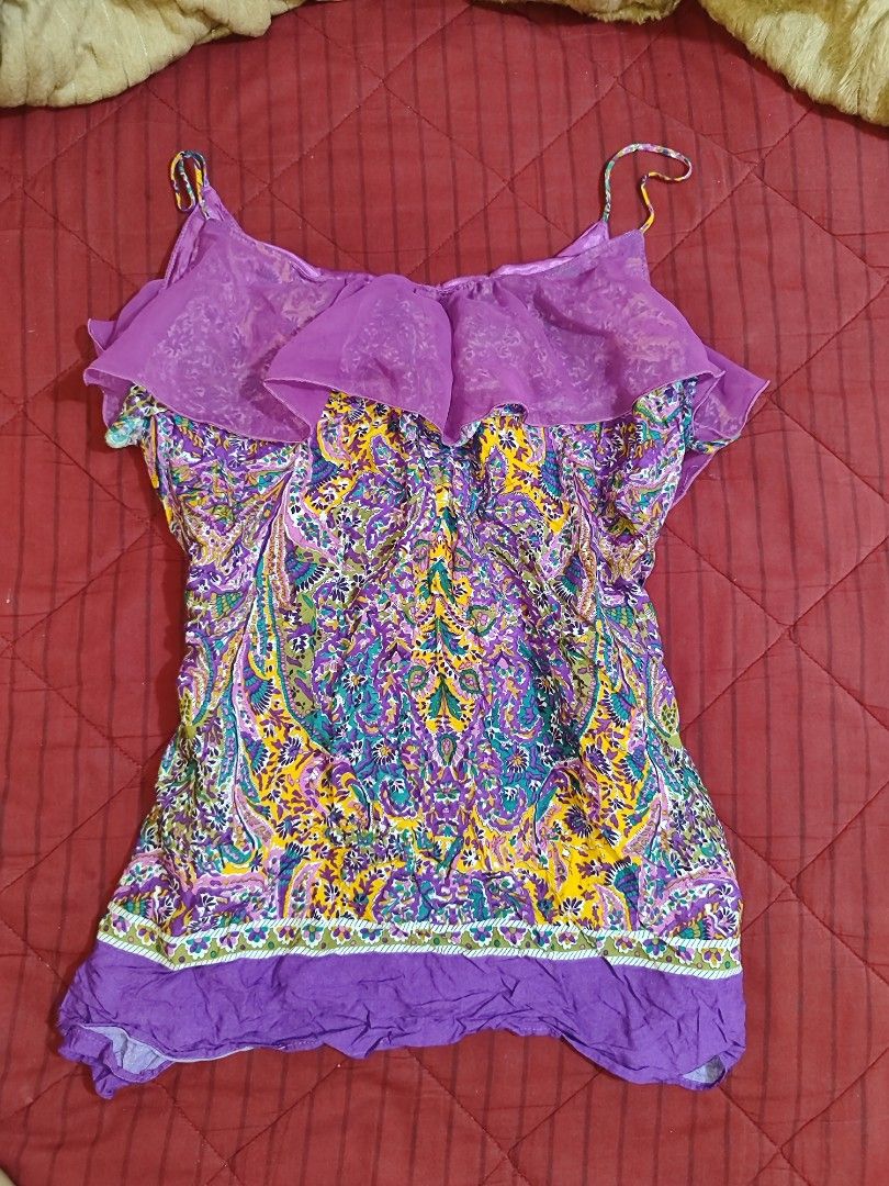 Camisole ruffle top (Category: Sleeveless) located in Iloilo. Submitted by cynehllevie (Listing ID 1460132405, Image 1). Description: This is a colorful paisley-print camisole featuring a distinct layered purple sheer ruffle neckline. 🍥fits small to medium.