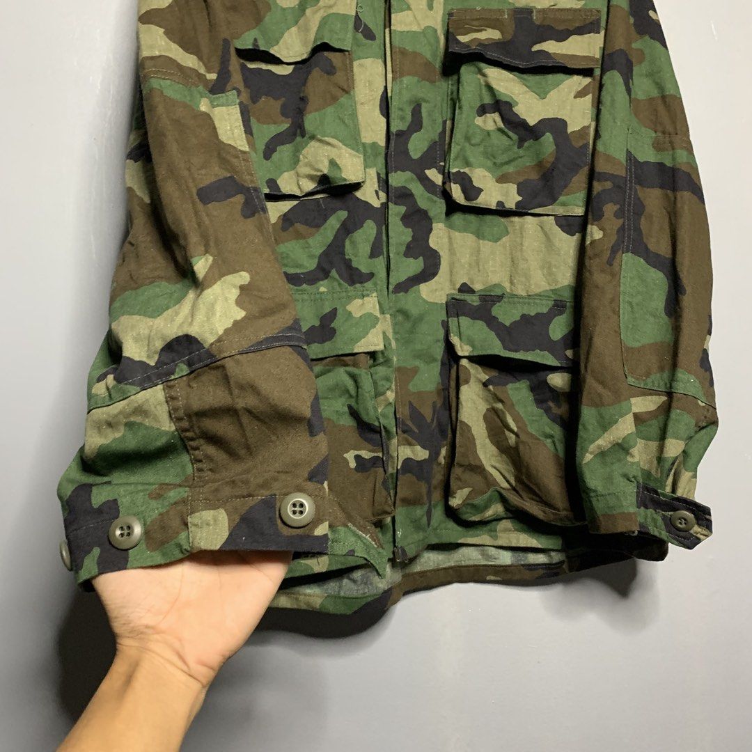 Camouflage Military Field Jacket (Category: Coats, Jackets and Outerwear) located in Manila. Submitted by emplysthrift. (Listing ID 1460259314, Image 3). Description: Width "23.5 Length "30 Excellent Condition Colorrate: 9.5/10 Flaws: needwash Unli vouch/vc for safe transactions 📲 Location: Laspinas City, Metro Manila, Brngy Talon Uno. 📍 DM IF INTERESTED📥 - Classic woodland camouflage pattern - Durable, heavy-duty material - Multiple front poc