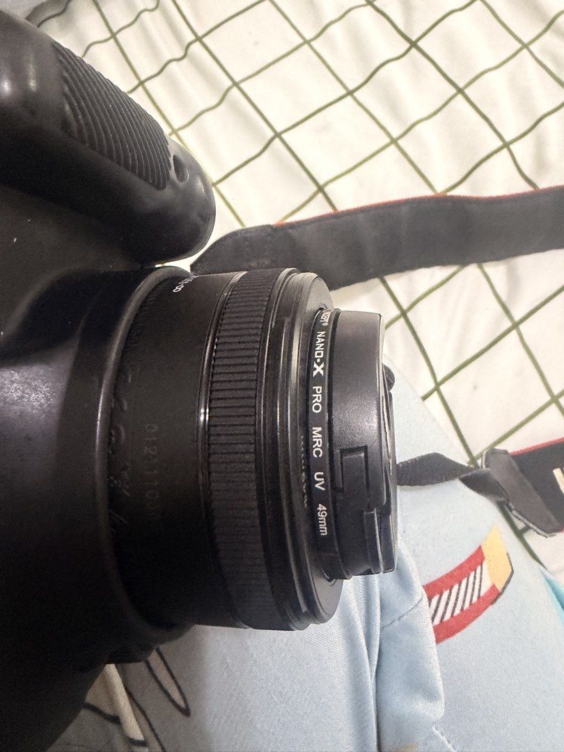 Canon 600D with 50mm lens (Category: Cameras) located in Manila. Submitted by cheeelkim (Listing ID 1460234938, Image 2). Description: Canon 600D with soft silicone rubber case With 50mm lens With Nano X Pro UV lens filter With extra battery and charger Shutter count: 25,249.