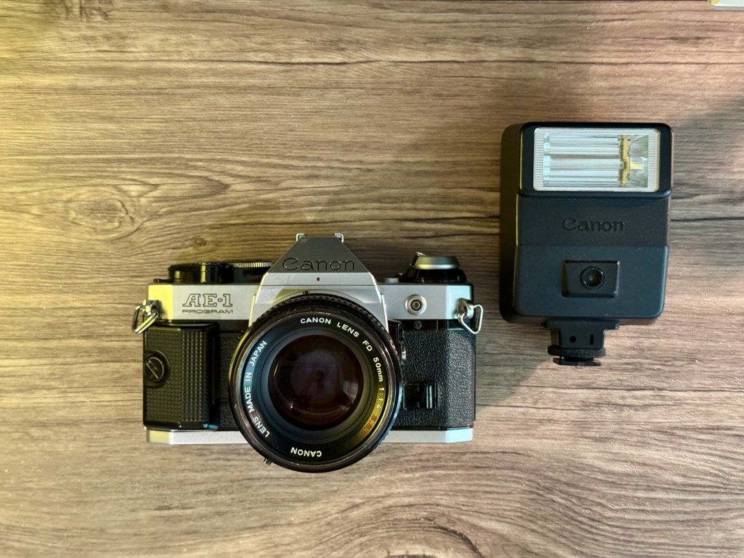 Canon AE-1 Program with Canon Flash (Category: Cameras) located in Calapan. Submitted by sunghoon23 (Listing ID 1460131032, Image 3). Description: Selling Only - No Swaps Canon AE-1 Program 35mm SLR Film Camera Canon 50mm f1.4 FD Lens Canon Speedlight 155A Flash + Good working condition + Dry cabinet stored + Film tested + Light meter working + Clear Viewfinder and Lens + Cosmetic 9/10 Rfs - Need funds for Hospital Bills and Medications Willing t