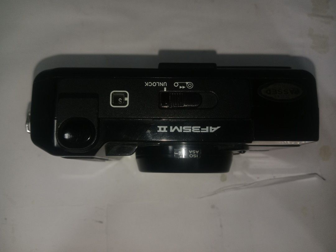 Canon AF35M 2 AS IS (Category: Cameras) located in Manila. Submitted by sellingstraightbsvintage (Listing ID 1460233845, Image 3). Description: The AF35M 2, it is clean and disinfected. It has cracks, missing film clip holder (seen in picture), broken flash, squealing. It has been proven it works, but due to massive defects it is better for a display, or repair. Lalamove shipping. Will be packed and shipped on Saturday or Sunday..