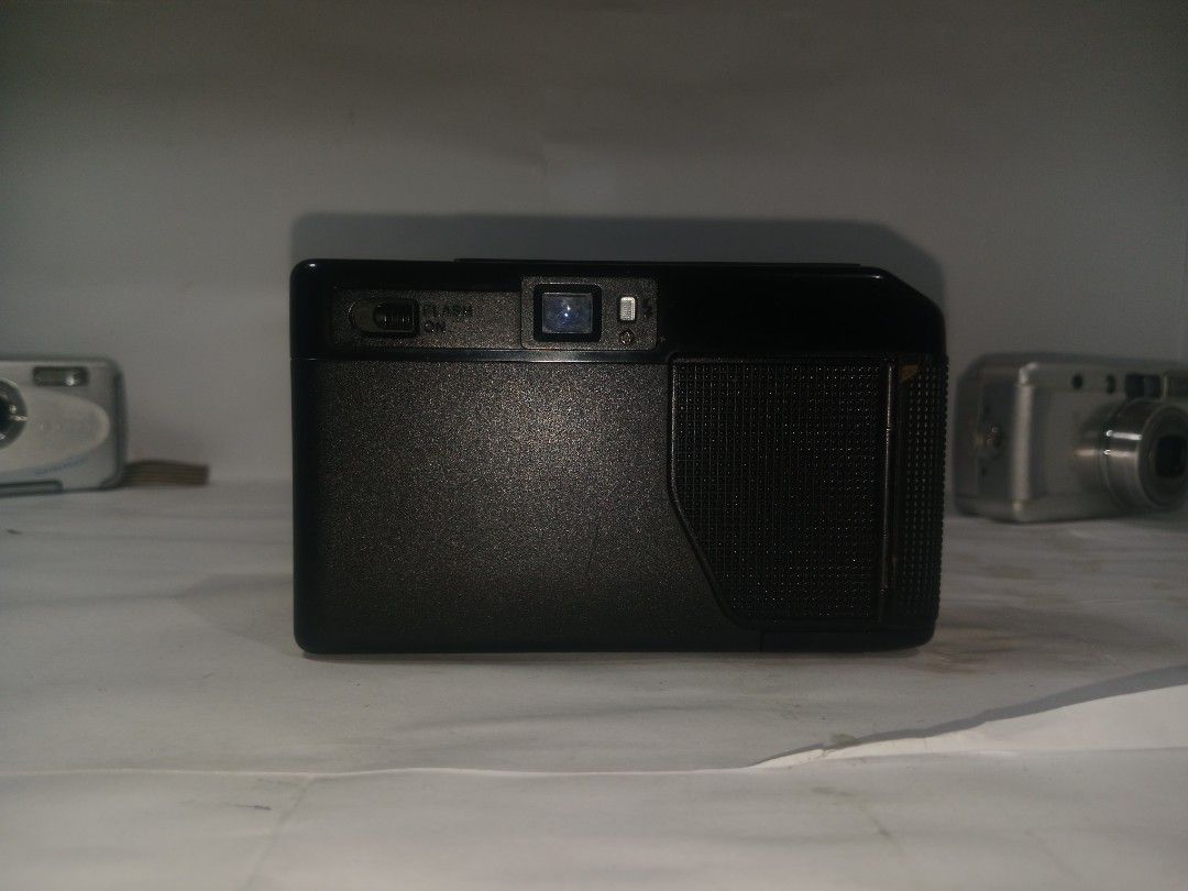 Canon AF35M 2 AS IS (Category: Cameras) located in Manila. Submitted by sellingstraightbsvintage (Listing ID 1460233845, Image 2). Description: The AF35M 2, it is clean and disinfected. It has cracks, missing film clip holder (seen in picture), broken flash, squealing. It has been proven it works, but due to massive defects it is better for a display, or repair. Lalamove shipping. Will be packed and shipped on Saturday or Sunday..