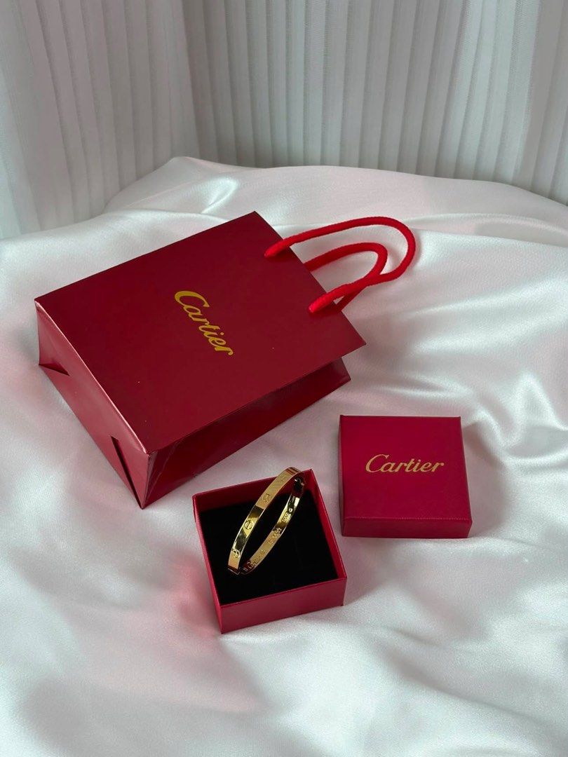 Cartier Bangle (Category: Body Jewelry) located in Manila. Submitted by heroofmanila (Listing ID 1460288572, Image 1). Description: 3 Days Pre-order Cartier Bangle - With box and paper bag - With Cartier brand stamped - Non-tarnish, hypoallergenic - Payment first; Maribank and BPI.