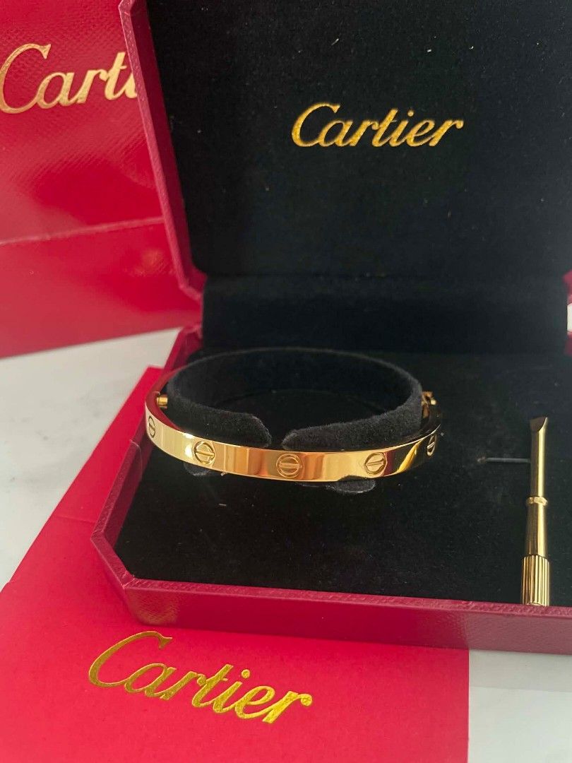 Cartier Gold Love Bracelet / Bangle (Category: Bracelets) located in Kuala Lumpur. Submitted by scchin3300570 (Listing ID 1435028126, Image 1). Description: Cartier Love Bracelet Bangle 24k golg plated size 17 Come with box paper bag.
