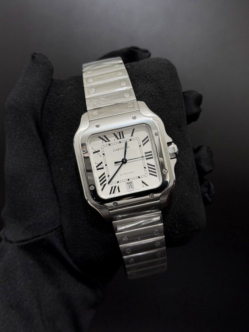 Cartier Santos Large 2024 White Dial (Category: Luxury Watches) located in Antipolo. Submitted by gold.authority (Listing ID 1460266848, Image 2). Description: CARTIER SANTOS LARGE 2024 WSSA0018 39.8mm Large Model Almost Brand New Condition Complete Inclusions Original Steel Bracelet and Leather Strap are both unused (Previous owner preferred using a separate Original Cartier leather strap, recently removed) Cartier Warranty Extended Until 2032 g