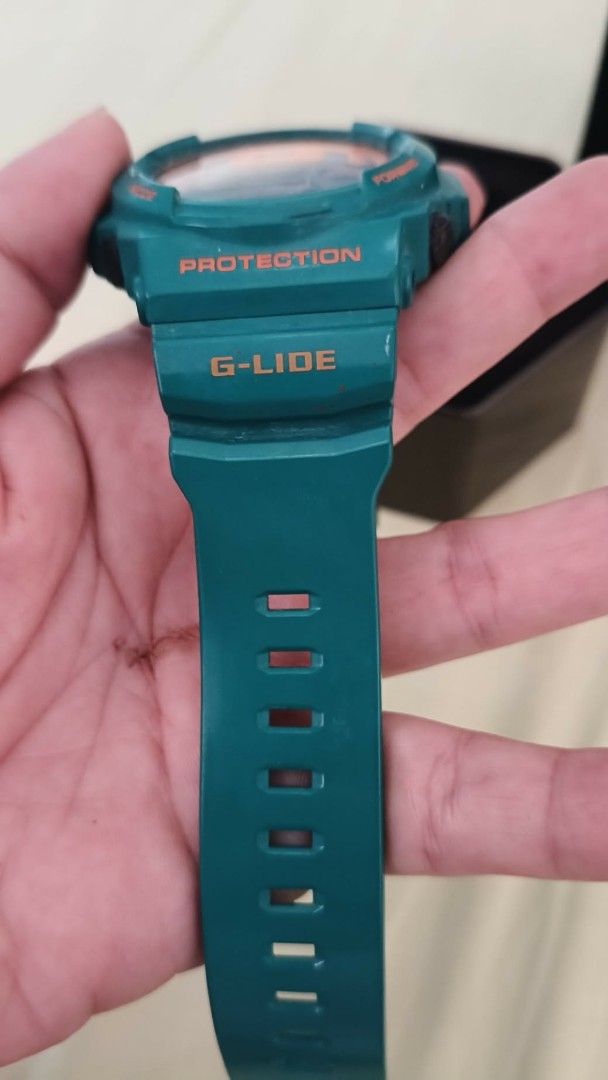 Casio G-Shock G-Lide Watch Teal Orange (Category: Men's Watches) located in Bulacan. Submitted by aichang21 (Listing ID 1460117902, Image 2). Description: - Teal and orange Casio G-Shock G-Lide watch - Water resistant up to 20 bar (200 meters) - Comes with original tin and box - Perfect for sports or everyday wear - Selling as is.