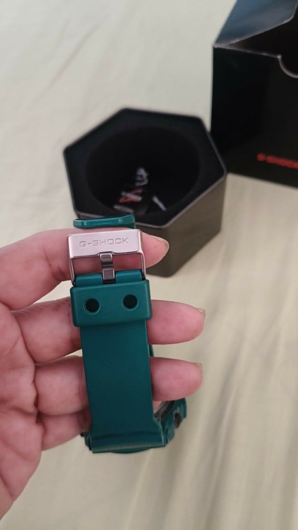 Casio G-Shock G-Lide Watch Teal Orange (Category: Men's Watches) located in Bulacan. Submitted by aichang21 (Listing ID 1460117902, Image 3). Description: - Teal and orange Casio G-Shock G-Lide watch - Water resistant up to 20 bar (200 meters) - Comes with original tin and box - Perfect for sports or everyday wear - Selling as is.