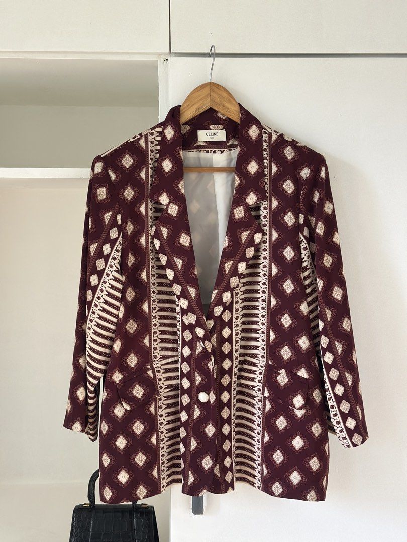 Celine Burgundy Geometric Print Blazer (Category: Coats, Jackets and Outerwear) located in Marikina City. Submitted by usage.ph (Listing ID 1460135120, Image 1). Description: - Burgundy blazer with a stylish cream geometric print. - Features a classic lapel and secure button closure. - Includes two functional front pockets. - Effortlessly transitions from casual to formal wear. - A perfect statement piece to elevate any outfit..