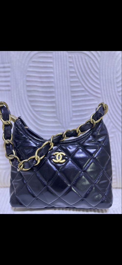 CH Black Quilted Chain Mini Hobo Shoulder Bag (Category: Shoulder Bags) located in San Fernando. Submitted by prelovednook2026 (Listing ID 1460256366, Image 1). Description: Chanel Premium - Proce Negotiable .