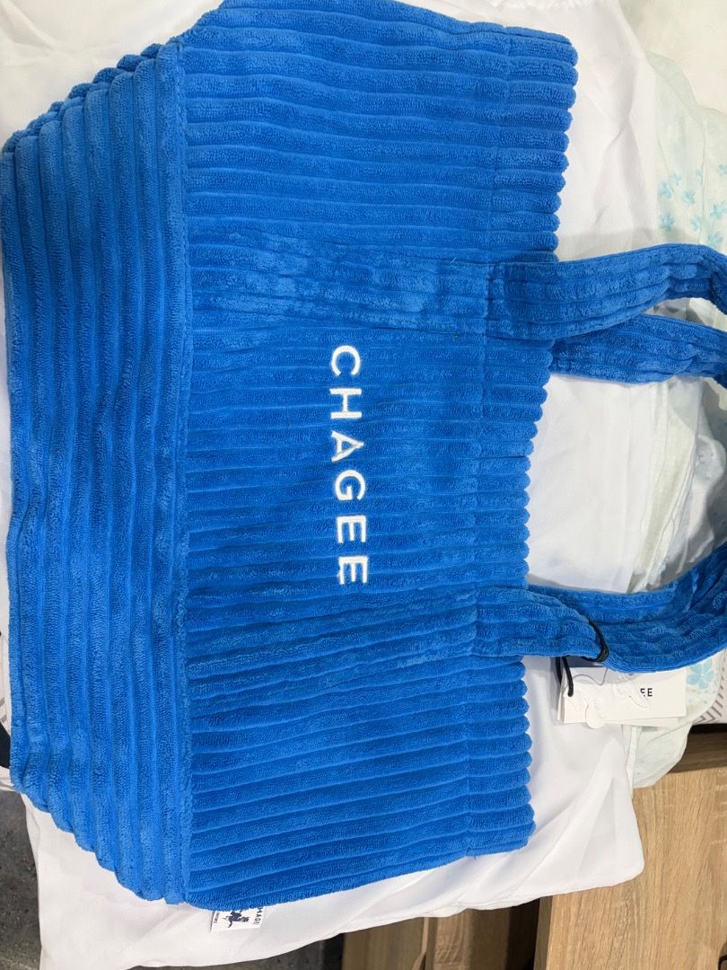 CHAGEE Blue Corduroy Tote Bag (Category: Tote Bags) located in Imus. Submitted by wilddolphin_58a401 (Listing ID 1460192759, Image 1). Description: - Cute blue corduroy tote bag from CHAGEE - Main compartment with inner zip pocket and slip pocket - Corduroy handles - Comes with original dust bag - Ideal for everyday use.