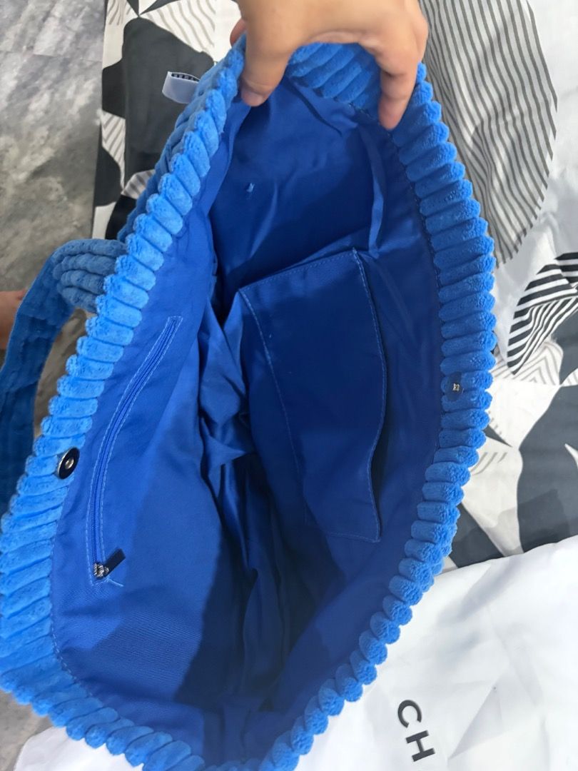 CHAGEE Blue Corduroy Tote Bag (Category: Tote Bags) located in Imus. Submitted by wilddolphin_58a401 (Listing ID 1460192759, Image 3). Description: - Cute blue corduroy tote bag from CHAGEE - Main compartment with inner zip pocket and slip pocket - Corduroy handles - Comes with original dust bag - Ideal for everyday use.