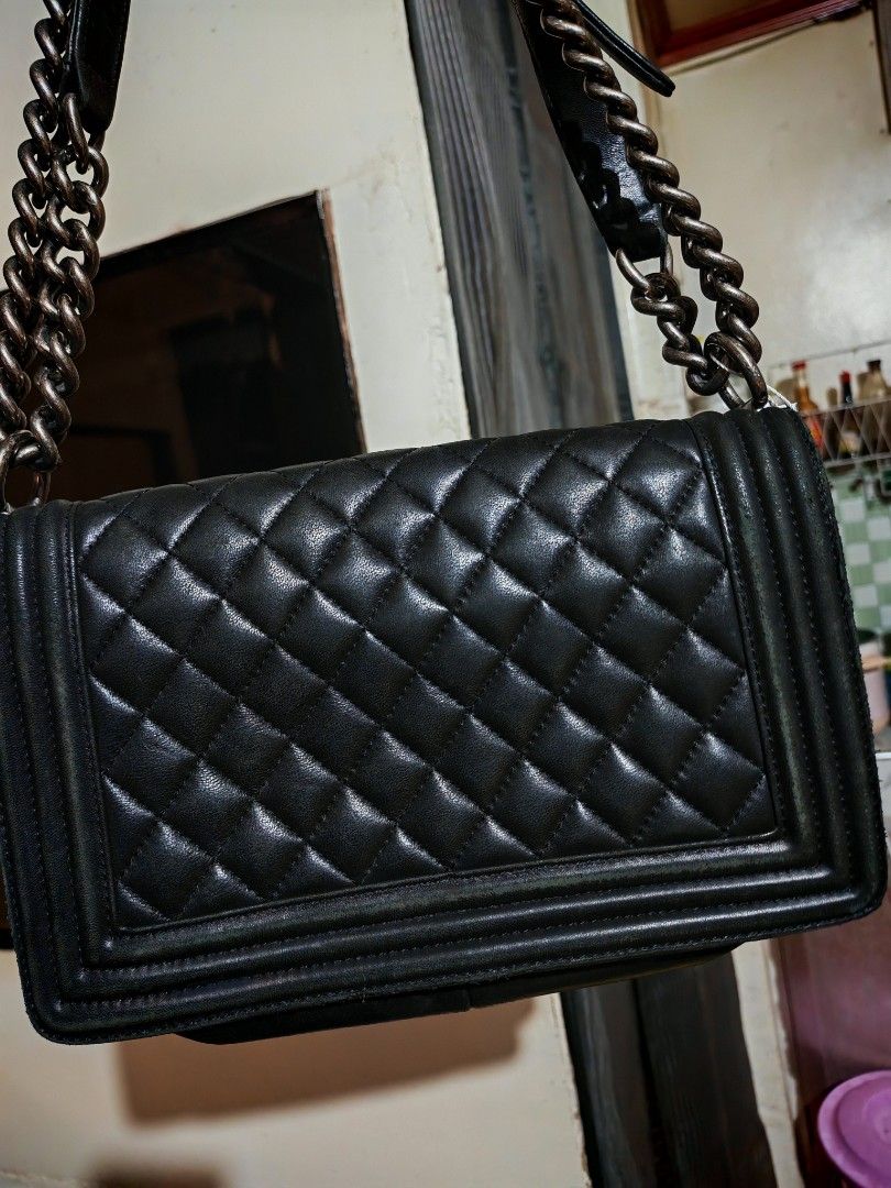 Chanel Black Quilted Leather Boy Bag (Category: Luxury Bags & Wallets) located in Manila. Submitted by cleverwhale_45b7bc (Listing ID 1460276433, Image 2). Description: - Classic black Chanel Boy bag - Quilted leather exterior - Silver hardware - Iconic Chanel logo clasp - Mixed leather and metal chain strap - Made in France - Versatile for day or night use.