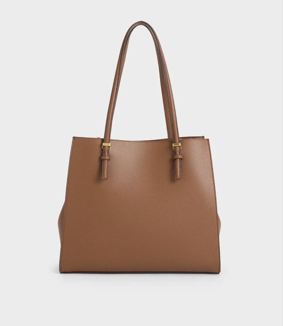 Charles & Keith | Sansa Tote Bag (Category: Shoulder Bags) located in Imus. Submitted by rrenzeene (Listing ID 1460177892, Image 3). Description: FS: Sansa Tote Bag in Chocolate‼️ - Barely used - Bought in Greenbelt 5 - Without paper bag - I’ll try to look for receipt - No to low ballers, sorry. RFS: decluttering (nakatambak na lang) MOP: GCash / Maribank 📍Shipping from Imus and Makati.