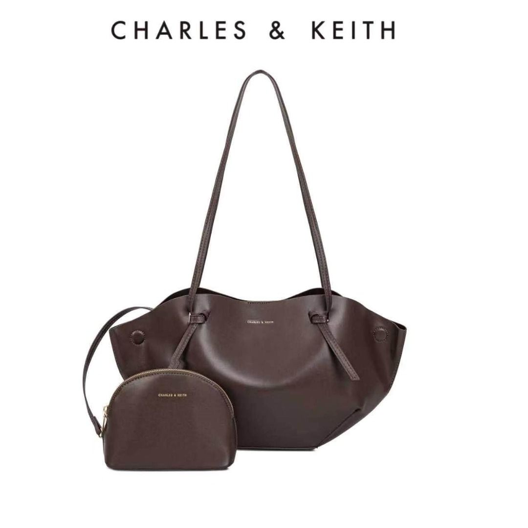Charles & Keith Calla Tote Bag with wallet (Category: Tote Bags) located in Quezon City. Submitted by makescentsmnl (Listing ID 1460272079, Image 1). Description: Charles & Keith Calla Tote Bag ORIG MALL PULLOUT Size:40x25x10 cm With dust bag&serial number MOP ✅ GCASH ✅ BANK TRANSFER ✅ CREDIT CARD ✅ QRPH.