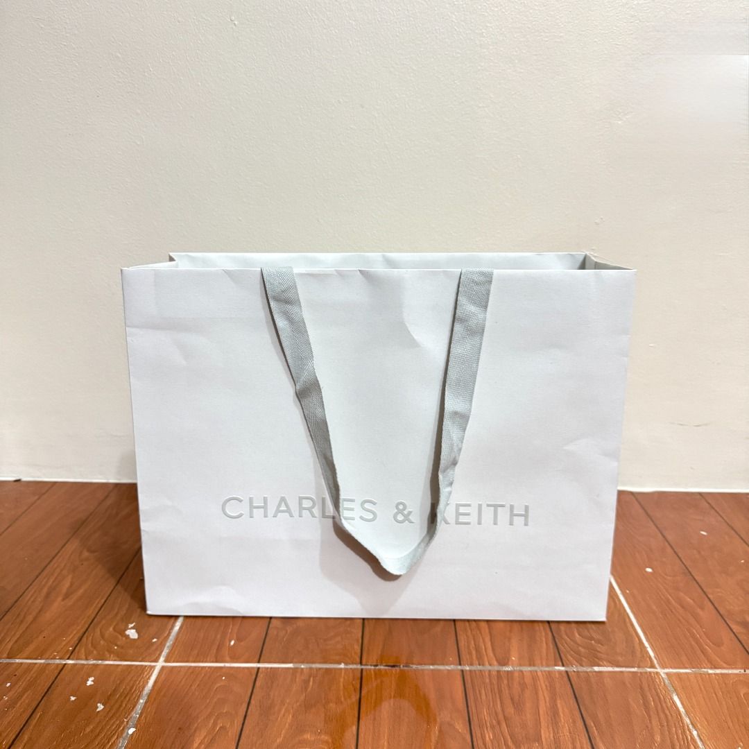Charles & Keith Large Paper Bag (Category: Other Stationery & Craft) located in Manila. Submitted by destashedmnl (Listing ID 1460166062, Image 1). Description: 💫 FREE SHIPPING WITHIN METRO MANILA 💫 (₱500 & up worth of purchase via J&T) ✨ Size & Stock: L - 1 🩶 Message me for more info/photos. 😊 🩶 MOP: BDO/BPI/GCASH/GOTYME 🩶 MOD: -Lalamove (Same Day Delivery: Metro Manila and nearby provinces) -J&T ; starts at ₱50 sf (Metro Manila/Provincial