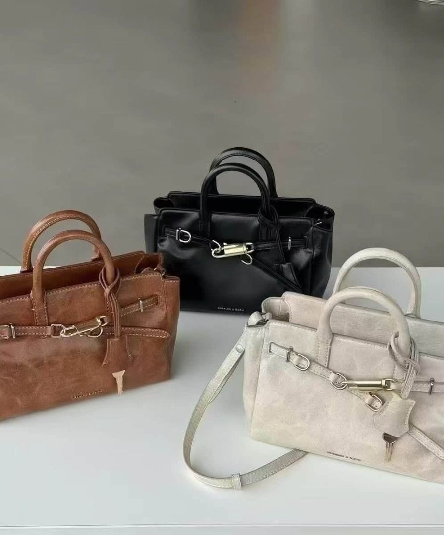 Charles & Keith Mini Delfina Belted Tote Bag (Category: Cross-body Bags) located in Quezon City. Submitted by makescentsmnl (Listing ID 1460267629, Image 1). Description: Charles & Keith Mini Delfina Belted Tote Bag ORIG MALL PULLOUT Size:13x10x5 inches With dust bag&serial number MOP ✅ GCASH ✅ BANK TRANSFER ✅ CREDIT CARD ✅ QRPH.