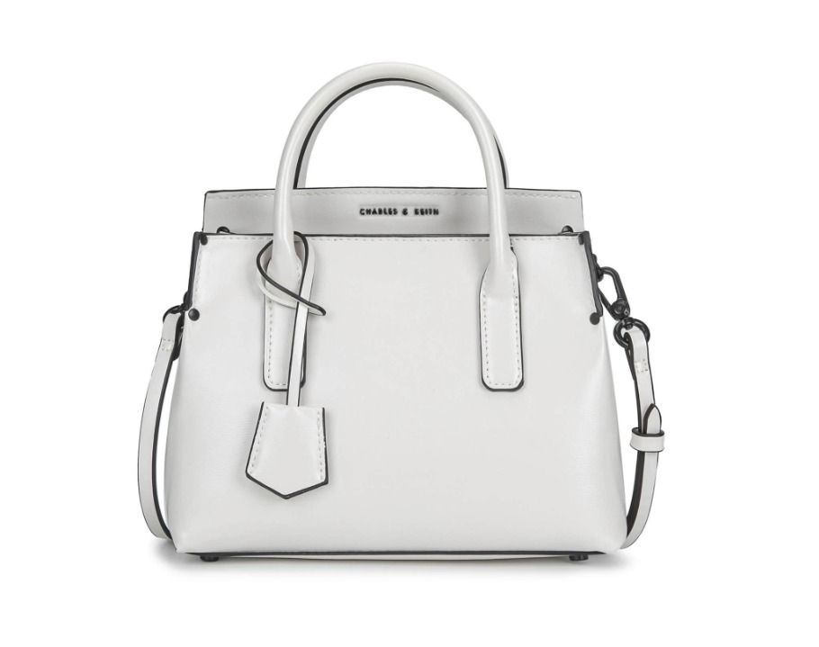 Charles & Keith Rene Structured Top Handle Bag (Category: Wallets & Card holders) located in Quezon City. Submitted by makescentsmnl (Listing ID 1460253296, Image 3). Description: Charles & Keith Rene Structured Top Handle Bag ORIG MALL PULLOUT Size:26x22x8 cm With dust bag&serial number MOP ✅GCASH ✅BANK TRANSFER ✅CREDIT CARD ✅QRPH.