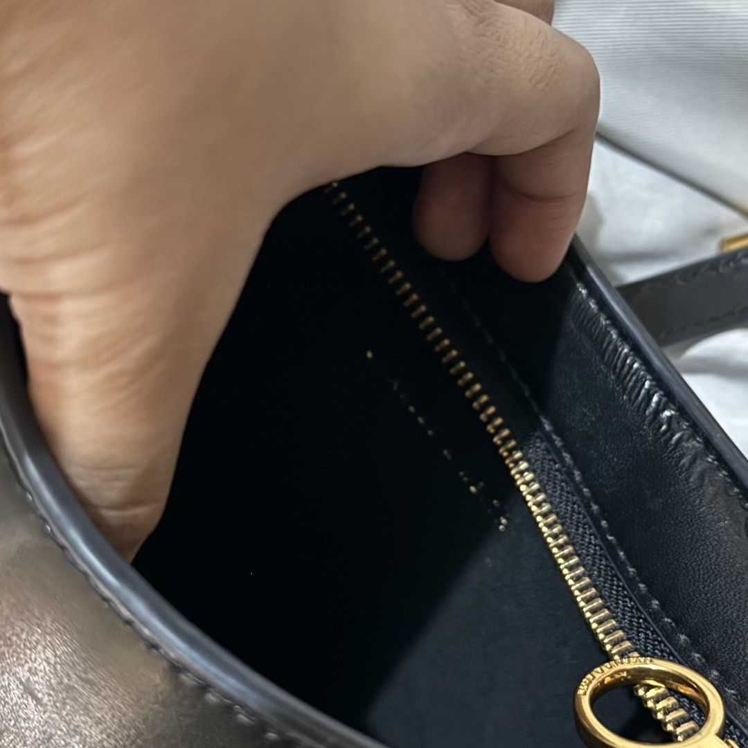 Charles and Keith Cesia Black Shoulder Bag (Category: Shoulder Bags) located in Quezon City. Submitted by a_closet04 (Listing ID 1460143982, Image 3). Description: - Brand: Charles & Keith - Color: Black - Feature: Gold buckle detail on the front - Closure: Zipper - Includes: Dust bag - Ideal for: Everyday use - my most favorite bag ever!!! RFS: investing in real leather bags 🤍.