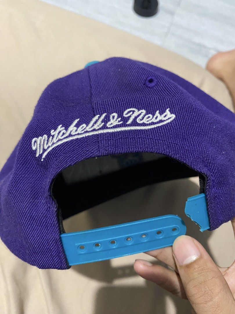 Charlotte Hornets two tone snapback hat (Category: Caps & Hats) located in Manila. Submitted by khielcalvin (Listing ID 1460226431, Image 2). Description: - Brand: Mitchell & Ness - Team: Charlotte Hornets - Style: Two-tone snapback hat - Colors: Purple crown, Teal brim - Features: Embroidered team logo and name on front Need new strap Offer Offer.