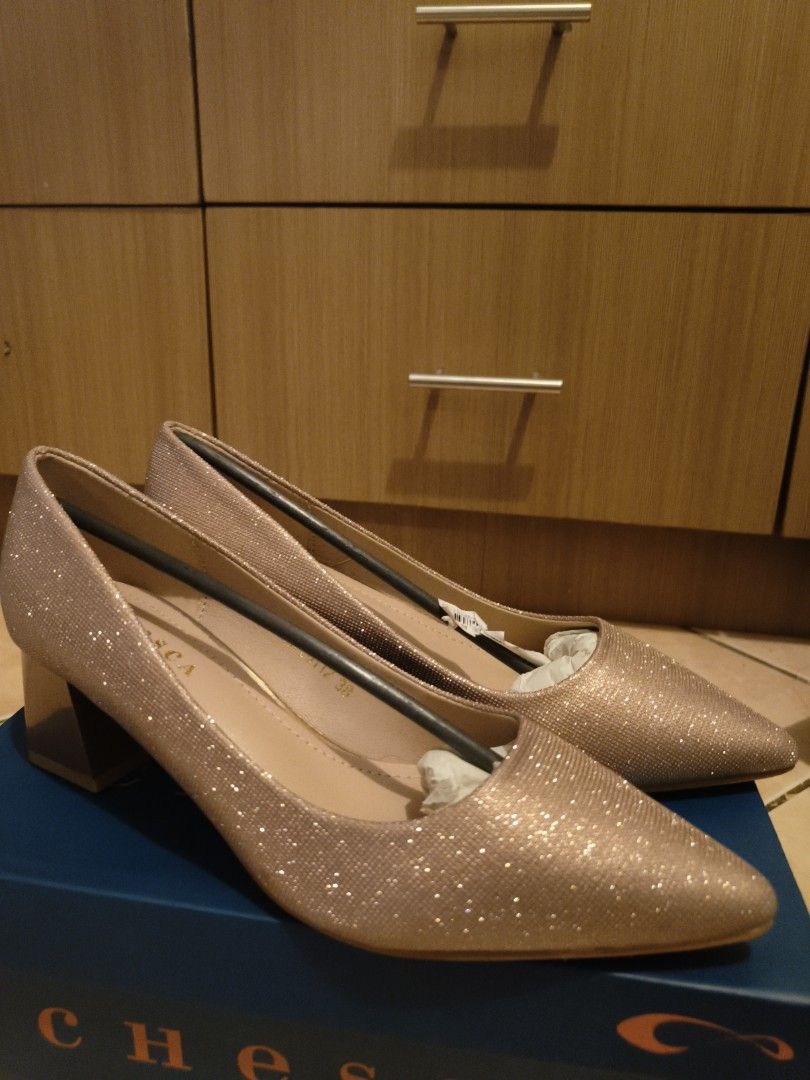 Chesca Glitter Block Heels (Category: Heels) located in Manila. Submitted by skiddles (Listing ID 1460283346, Image 2). Description: - Sparkly rose gold glitter block heels from Chesca. - Chic pointed toe design. - Comfortable chunky block heel for all-day wear. - Comes with original box. - Brand new, never worn. - Original price 1,499.00.