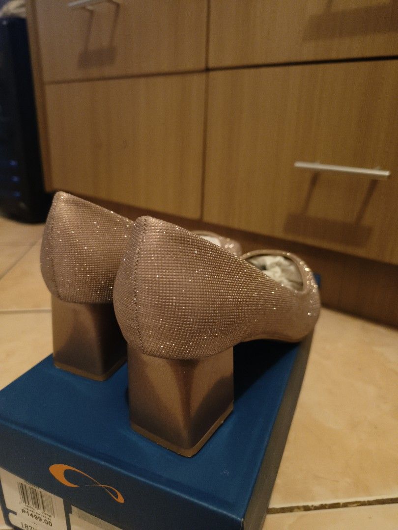 Chesca Glitter Block Heels (Category: Heels) located in Manila. Submitted by skiddles (Listing ID 1460283346, Image 3). Description: - Sparkly rose gold glitter block heels from Chesca. - Chic pointed toe design. - Comfortable chunky block heel for all-day wear. - Comes with original box. - Brand new, never worn. - Original price 1,499.00.