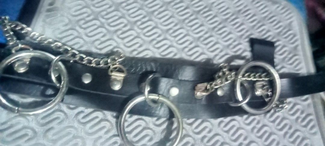 Choker Belt with Silver Chains and Rings (Category: Belts) located in Paranaque City. Submitted by dimaguilaa94969 (Listing ID 1460220602, Image 1). Description: - Cool black leather belt - Features silver chains and large O-rings - Includes smaller rings for added pm if int detail - Secure buckle closure - Perfect for adding an edgy touch to your style09260966619 .