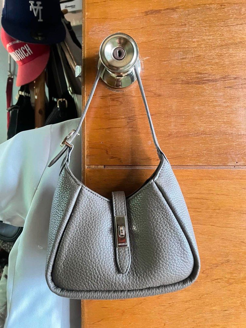 Chrisbella Gained Leather Hobo Shoulder Bag (Category: Purses & Pouches) located in Dasmarinas. Submitted by ryewithane (Listing ID 1460151687, Image 1). Description: Still in good condition, decluttering lang..