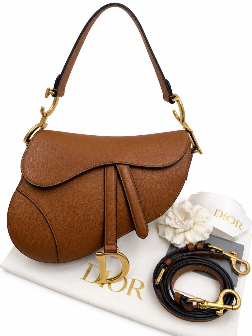 ⚜️Christian Dior - Saddle Medium bag🤎 (Category: Luxury Bags & Wallets) located in Makati City. Submitted by 90sangel (Listing ID 1460196680, Image 2). Description: That iconic saddle shape just hits different 🤎🐴 Timeless, effortlessly chic, and the kind of bag that makes every outfit feel expensive without even trying. •Size: Medium •Condition: As New! *Includes store dustbag, carecard and big paperbag. Box is optional not included from the S