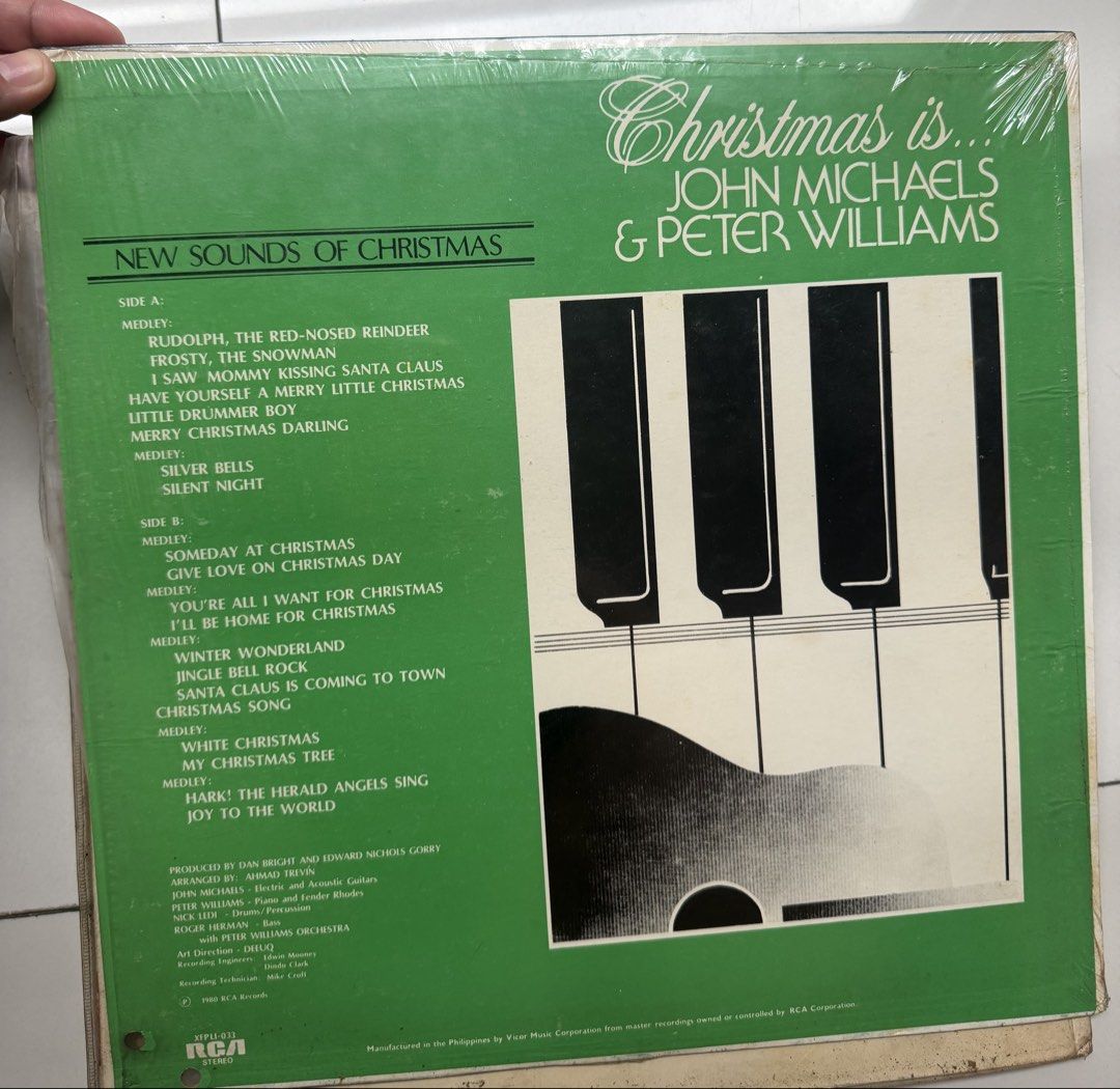 Christmas Is... John Michaels & Peter Williams Vinyl Record (Category: Vinyls) located in Manila. Submitted by eithne128 (Listing ID 1460156677, Image 2). Description: - Classic Christmas vinyl record featuring John Michaels and Peter Williams. - Beautiful cover art: snowy landscape with a tree and mountains. - A must-have for your holiday music collection. - Ideal for creating a cozy winter atmosphere..