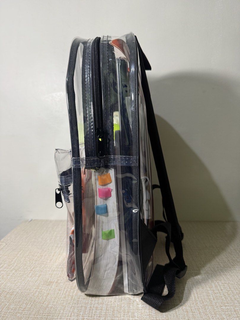 Clear Transparent Backpack with Front Zipper Pocket (Category: Backpacks) located in Manila. Submitted by tgs_2025 (Listing ID 1460270052, Image 3). Description: Clear transparent backpack. It has a main compartment and a front zipper pocket. The straps are black and adjustable. Great for school or concerts. You can see everything inside. Durable material..