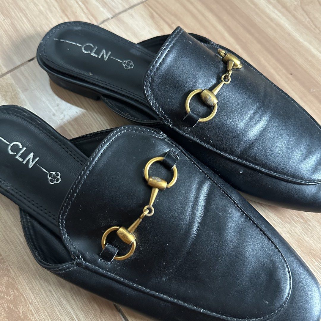 CLN Black Loafers (Category: Loafers) located in Bulacan. Submitted by itemsbyjj (Listing ID 1460199992, Image 3). Description: Original CLN black loafers Issue: dents on metal design, creases and unglued soles.