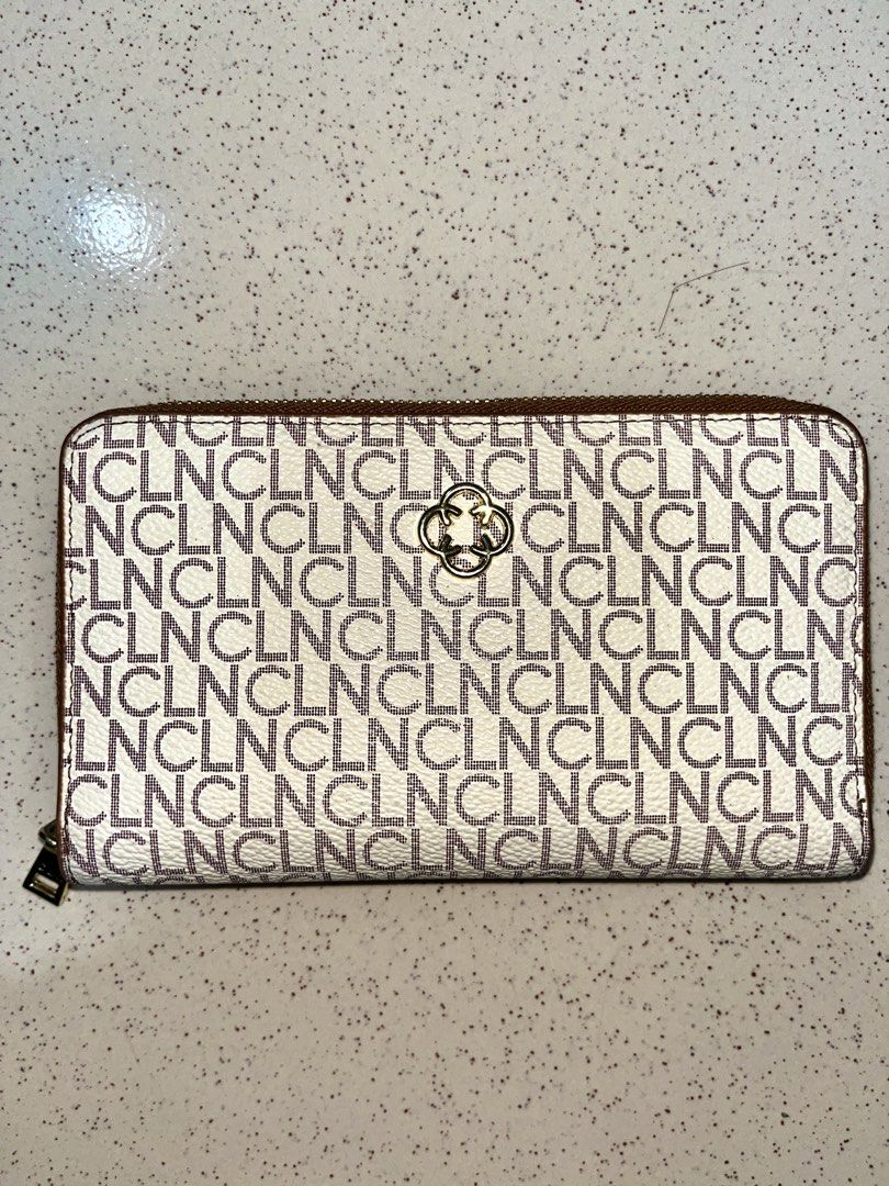 CLN Diva Long Zip wallet (Category: Wallets & Card holders) located in Rizal. Submitted by all_12 (Listing ID 1460261944, Image 1). Description: NO JOYJOY BUYERS PLEASE‼️ THANK YOU - Like new no issues, no damages - RFS :too many wallets - Interior: multiple card slots and zippered coin pocket - Comes with a dust bag -MOP Gcash or Maya -Lalamove or J&T .
