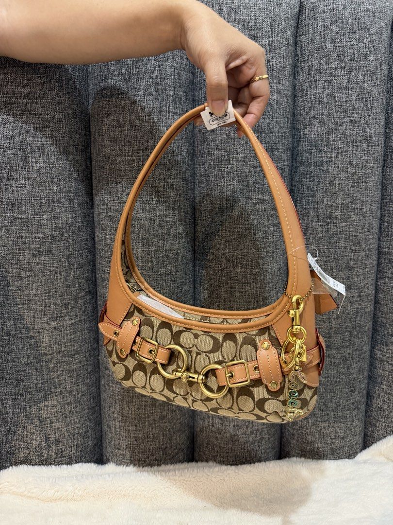 Coach Belted Ergo ❤️ (Category: Shoulder Bags) located in Las Pinas. Submitted by yhn_boutique (Listing ID 1460276173, Image 1). Description: Actual pic posted Lalamove ready Complete inc Dm .