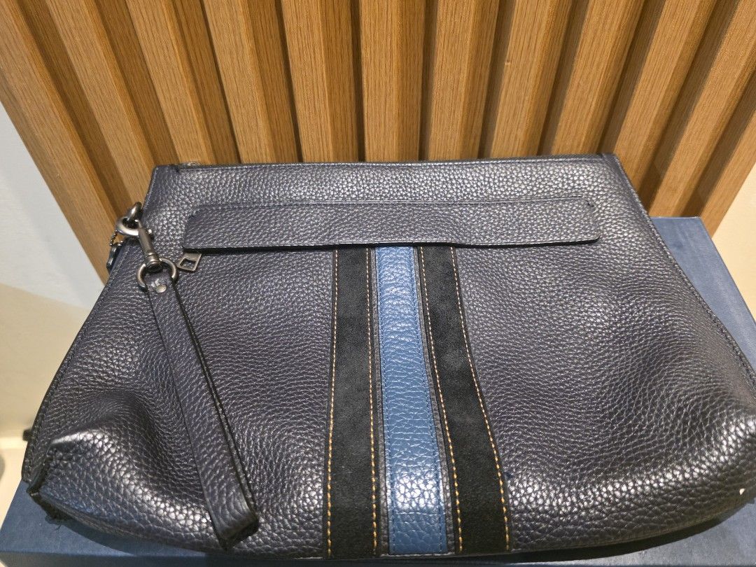 COACH Clutch Bag (Category: Luxury Bags & Wallets) located in Manila. Submitted by iantrepreneuer (Listing ID 1460153886, Image 3). Description: COACH Clutch Bag Lightly used In mint condition Naked (Bag Only) No more paper bag and receipt.