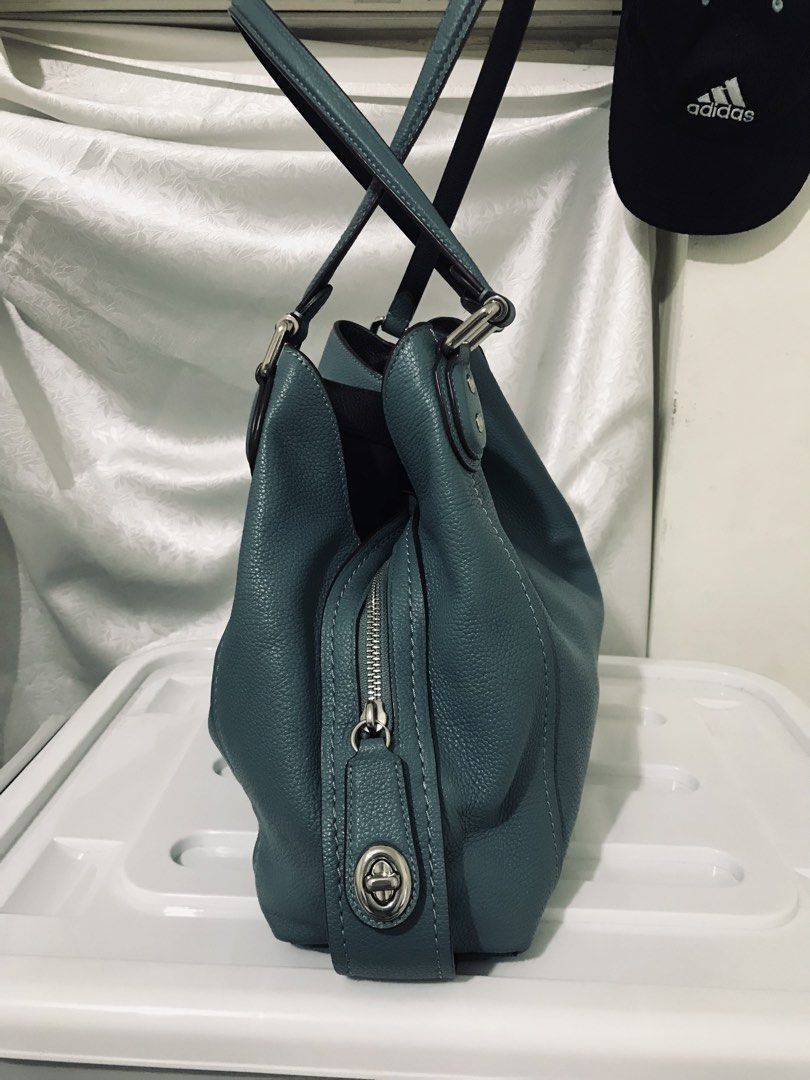 Coach Edie Leather Bag (Category: Shoulder Bags) located in Manila. Submitted by freecat.21c0ee (Listing ID 1460266401, Image 2). Description: Authentic Coach Edie Leather Exterior Medium Bag. Blue used like new..