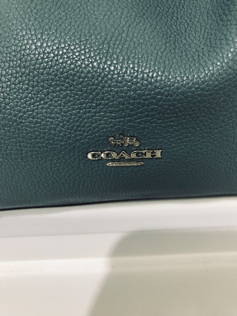 Coach Edie Leather Bag (Category: Shoulder Bags) located in Manila. Submitted by freecat.21c0ee (Listing ID 1460266401, Image 3). Description: Authentic Coach Edie Leather Exterior Medium Bag. Blue used like new..
