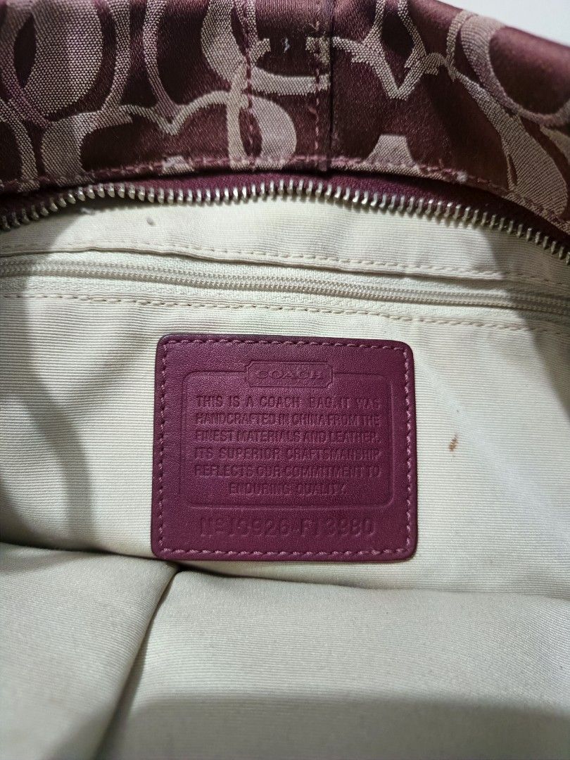 Coach Monogram Shoulder Bag (Category: Luxury Bags & Wallets) located in Angeles City. Submitted by gian1994 (Listing ID 1460193956, Image 3). Description: - Coach monogram shoulder bag - Burgundy and tan signature pattern - Leather trim and handles - Silver hardware - Interior zip and slip pockets - Clean interior - Great everyday bag.