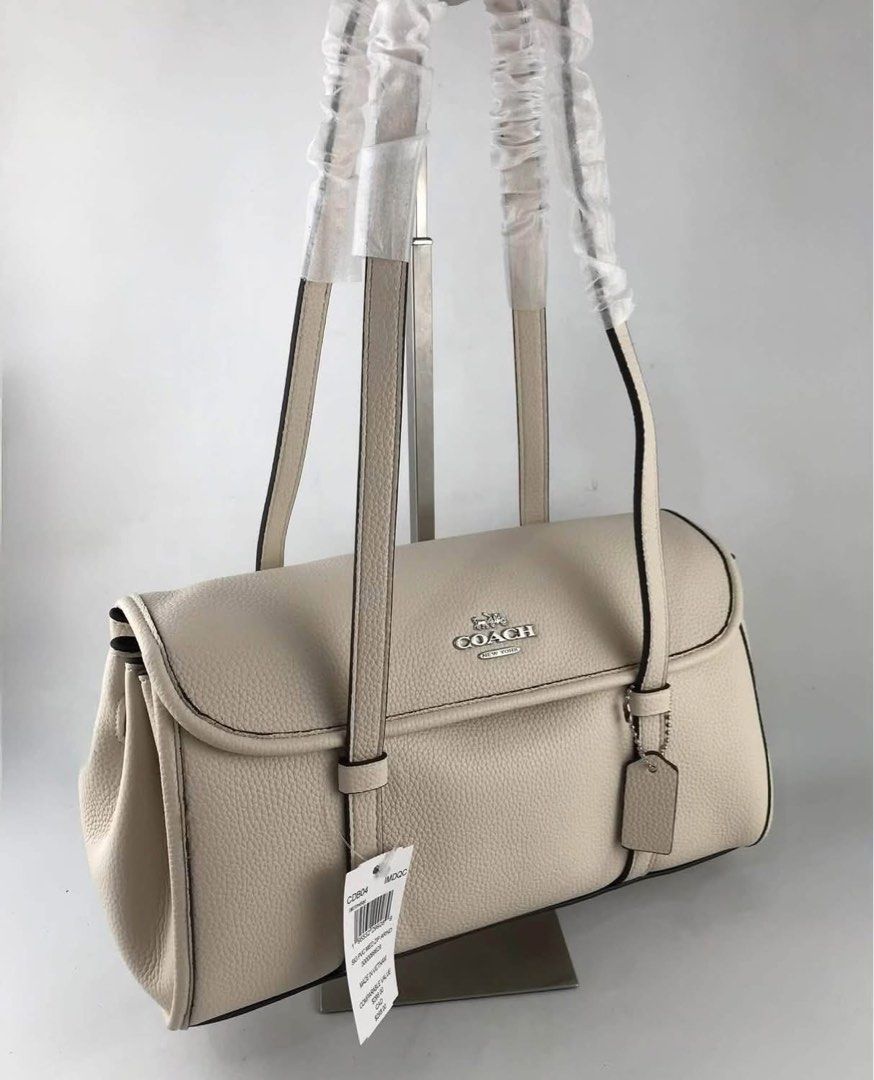 Coach shoulder bag (Category: Shoulder Bags) located in Manila. Submitted by gff.daily_flower (Listing ID 1460131390, Image 2). Description: With tag gift receipt dustbag and paperbag.