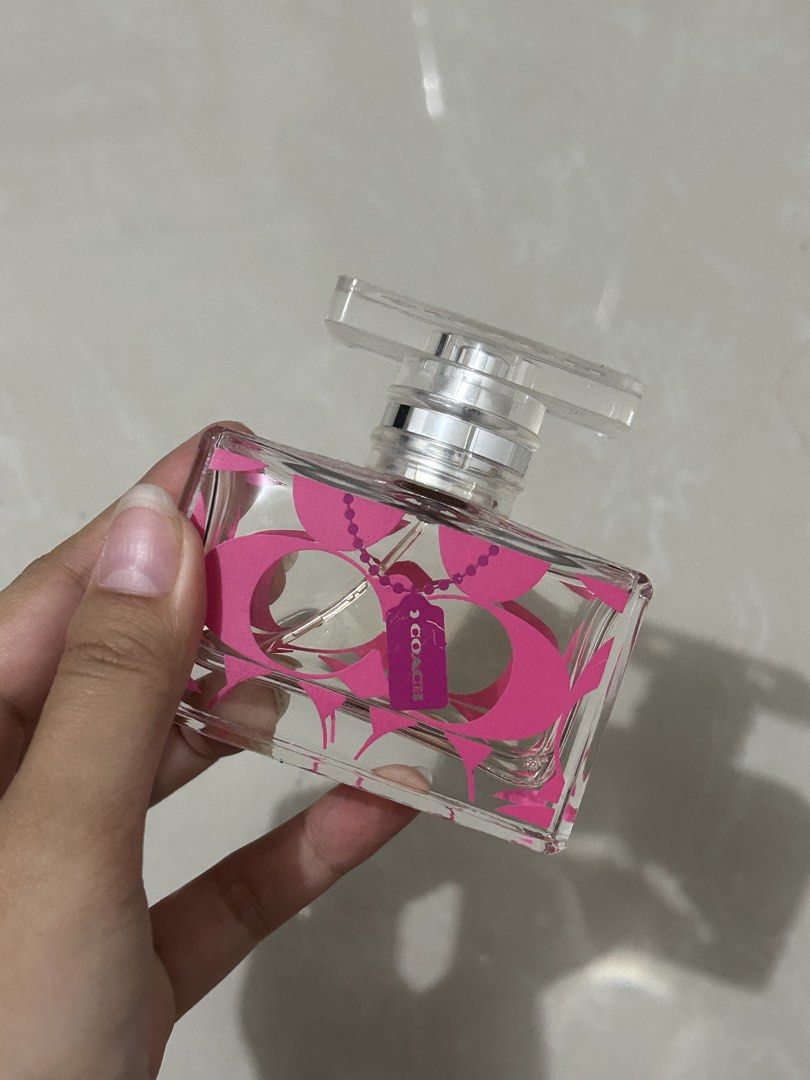 Coach Signature Pink Perfume Bottle (Category: Fragrance & Deodorants) located in Pasay City. Submitted by haxiea (Listing ID 1460224774, Image 1). Description: Used half of it already .