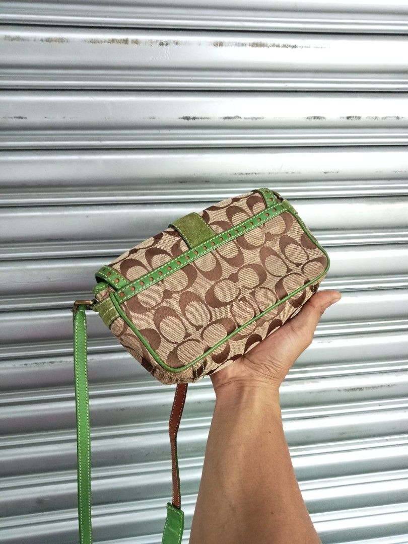 Coach soho mini shoulder bag (Category: Luxury Bags & Wallets) located in Bagabag. Submitted by thrift_stories96 (Listing ID 1460272164, Image 3). Description: Coach soho mini shoulder bag Measurements Height - 5 Width - 9 Condition - Rank AB Flaw - rubs leather coating ng inner strap,Normal sign of use due to its age vintage piece Needs cleaning nadin..