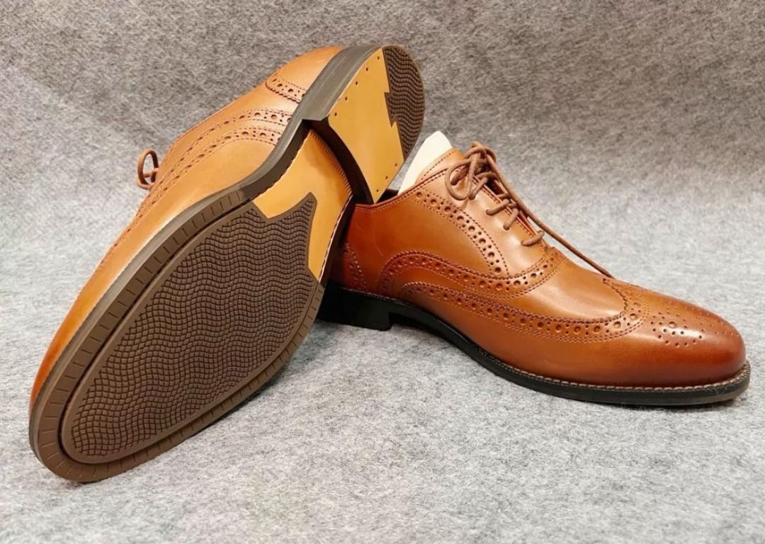 Cole Haan Broadway Wingtip C37617 Tan Brown (Category: Dress Shoes) located in Paranaque City. Submitted by silverphoenix.00302e (Listing ID 1460179718, Image 3). Description: - SIZE: EU 40, EU 40.5, EU 41, EU 42.5 - Classic tan leather wingtip oxfords - Brand: Cole Haan - Style: Lace-up - Versatile: Dress up or down - Features: Durable sole - Includes: Shoe trees - Condition: Ready for a new owner.