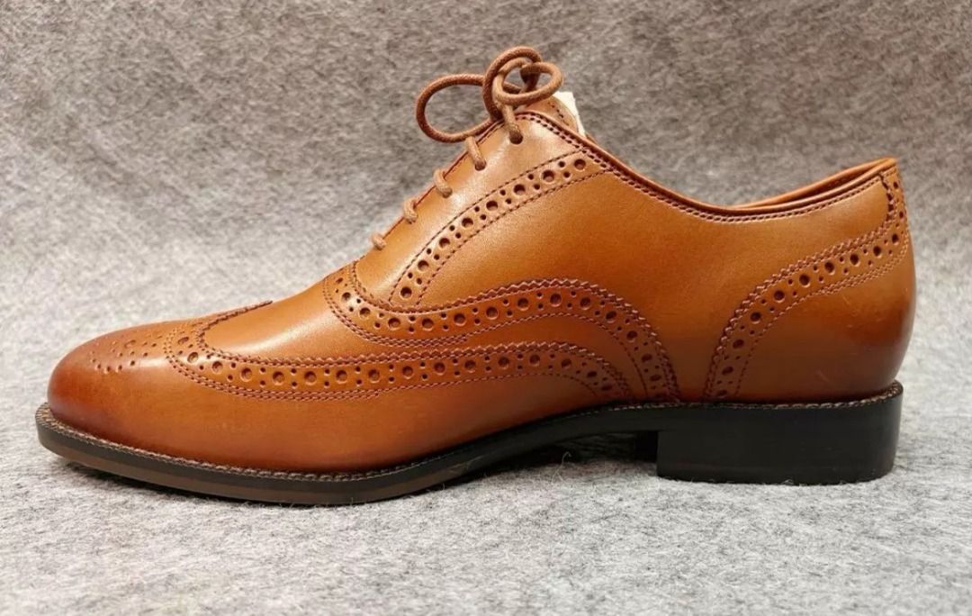 Cole Haan Broadway Wingtip C37617 Tan Brown (Category: Dress Shoes) located in Paranaque City. Submitted by silverphoenix.00302e (Listing ID 1460179718, Image 2). Description: - SIZE: EU 40, EU 40.5, EU 41, EU 42.5 - Classic tan leather wingtip oxfords - Brand: Cole Haan - Style: Lace-up - Versatile: Dress up or down - Features: Durable sole - Includes: Shoe trees - Condition: Ready for a new owner.