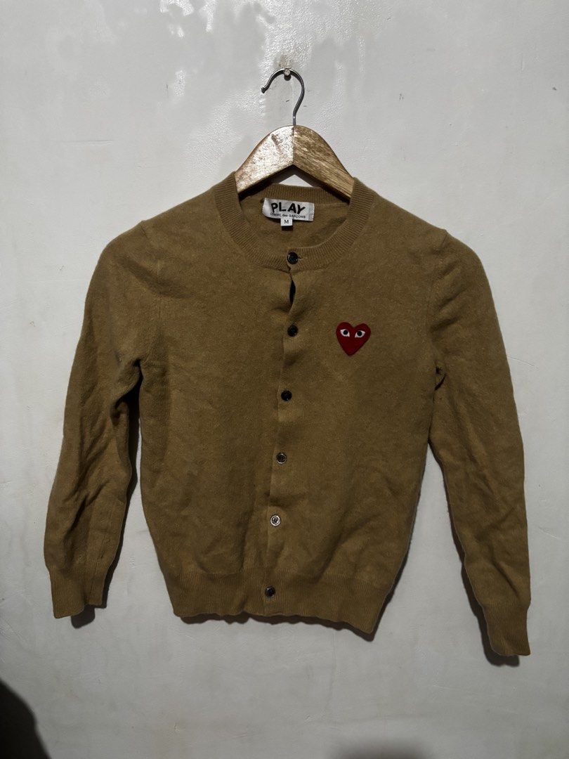 Comme De Garcons Play Wool Cardigan (Category: Coats, Jackets and Outerwear) located in Subic. Submitted by thriftpoison (Listing ID 1460116505, Image 1). Description: Comme De Garcons Play Cardigan medium length 21 width 16 like new .