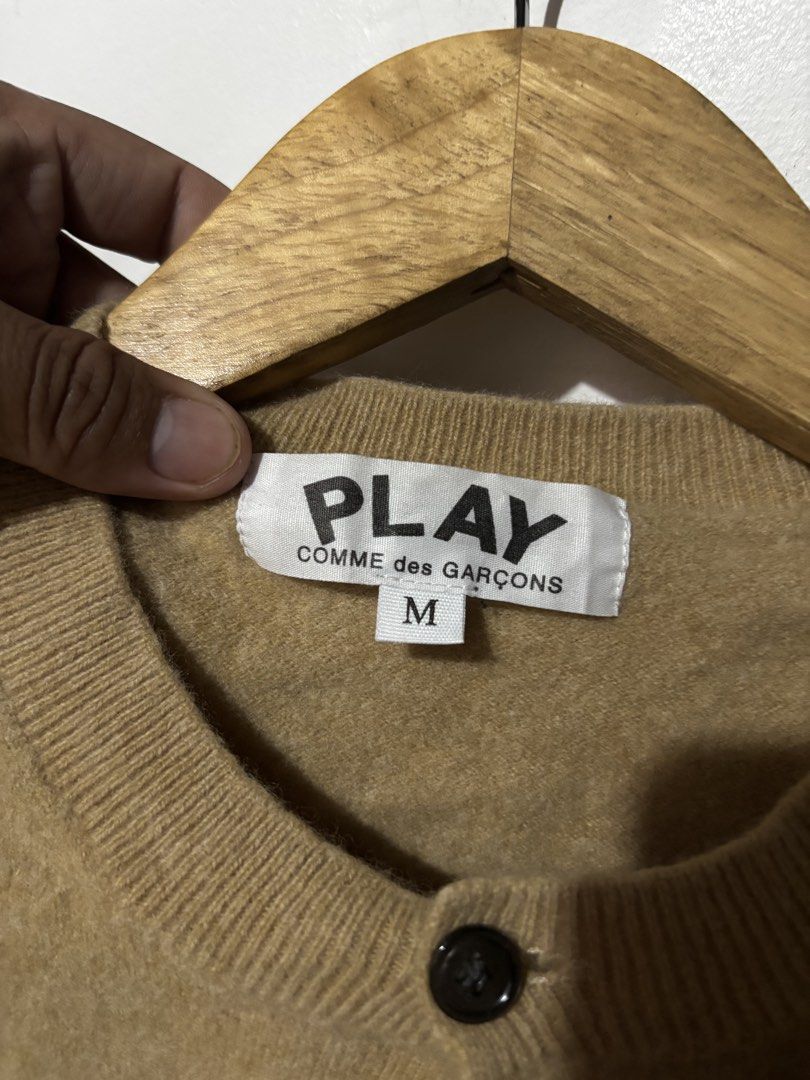 Comme De Garcons Play Wool Cardigan (Category: Coats, Jackets and Outerwear) located in Subic. Submitted by thriftpoison (Listing ID 1460116505, Image 3). Description: Comme De Garcons Play Cardigan medium length 21 width 16 like new .