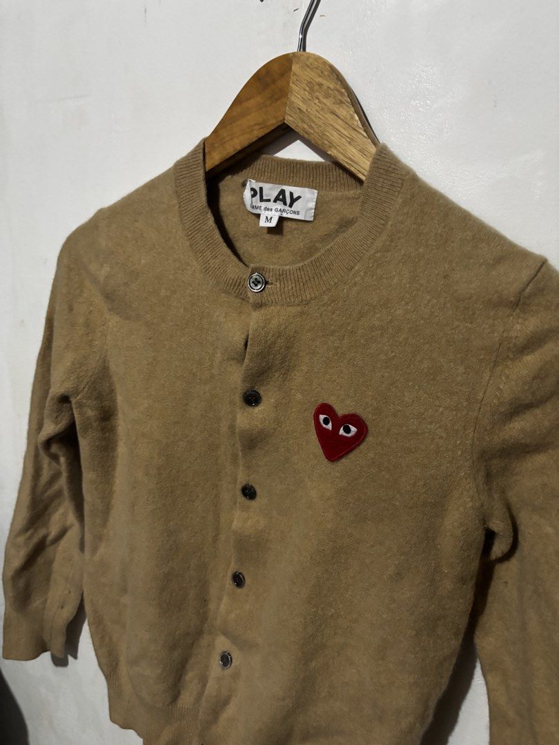 Comme De Garcons Play Wool Cardigan (Category: Coats, Jackets and Outerwear) located in Subic. Submitted by thriftpoison (Listing ID 1460116505, Image 2). Description: Comme De Garcons Play Cardigan medium length 21 width 16 like new .